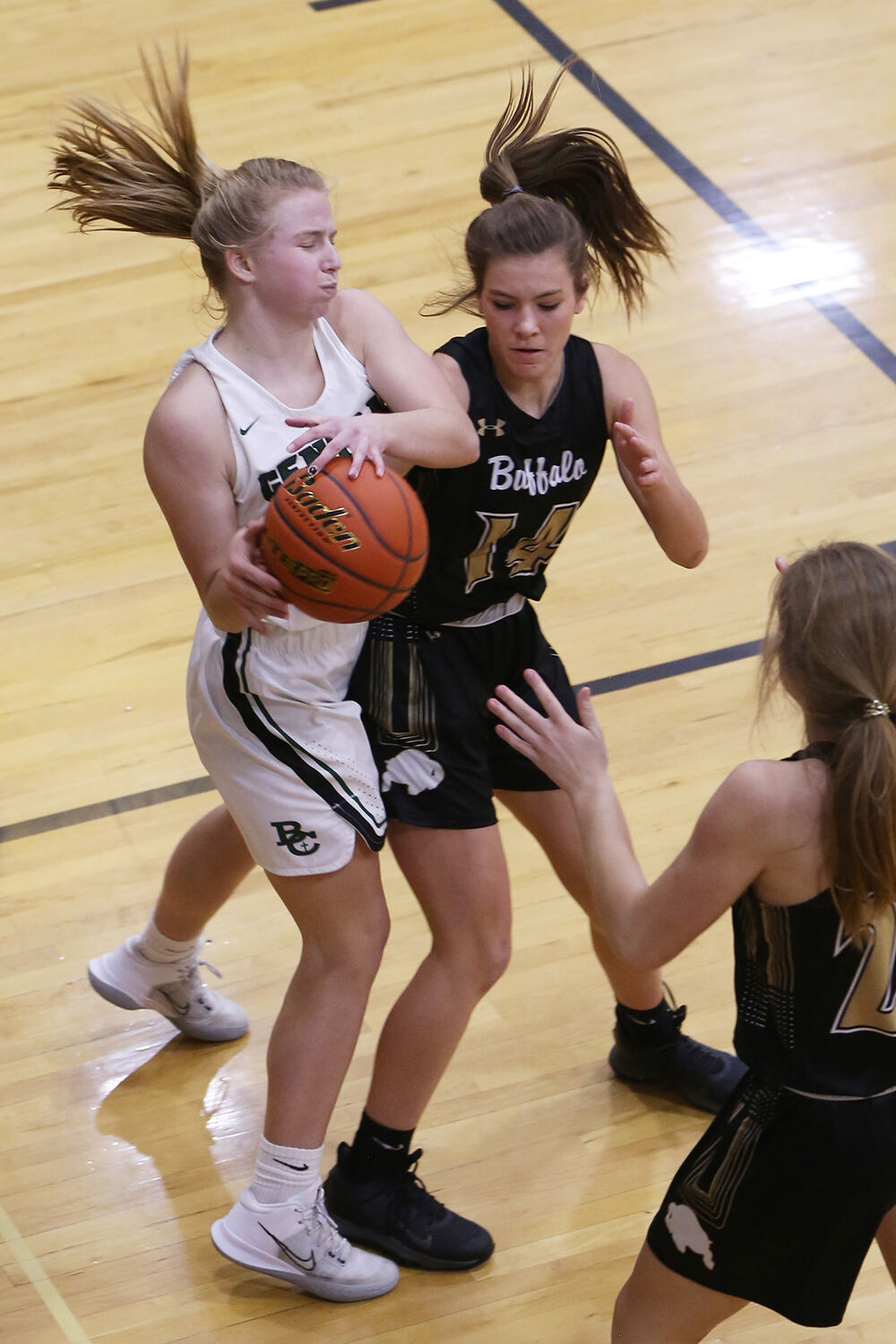 Tess Rule reaches to try to steal the ball away